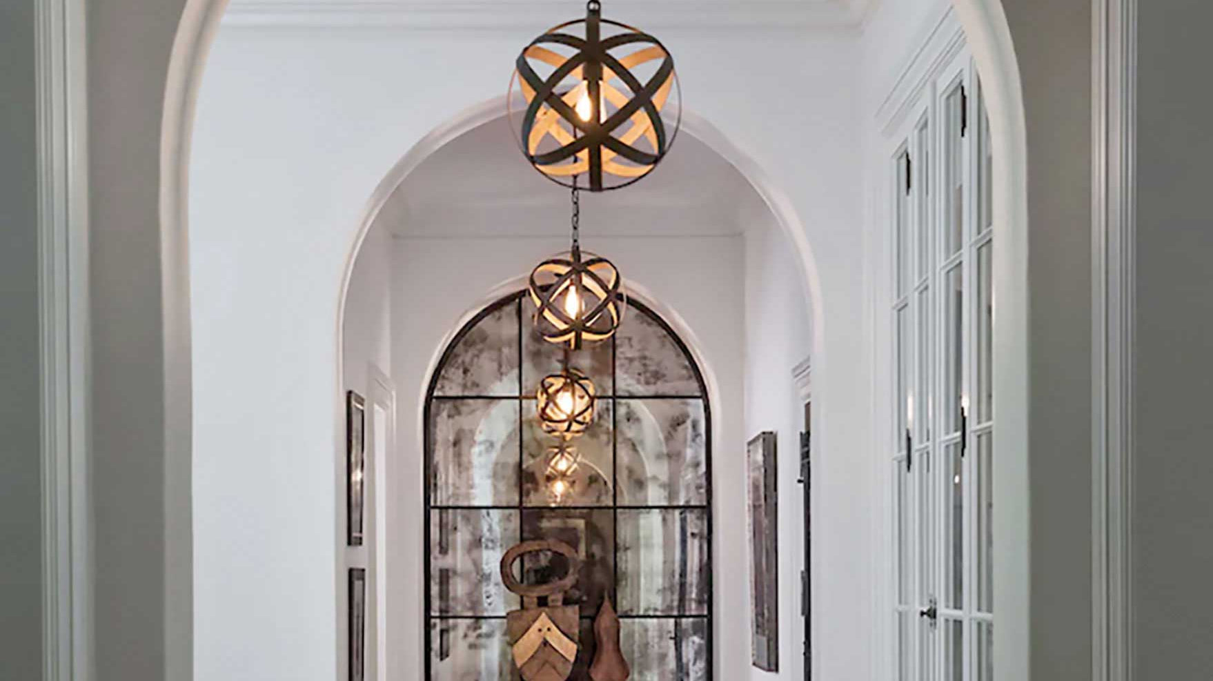 Hinkley light fixtures in hallway