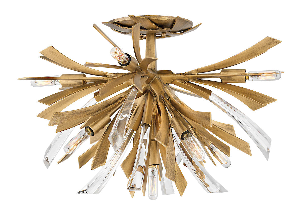 Fredrick Ramong gold gilded with custom icicle shaped crystal spears. Hollywood glam.